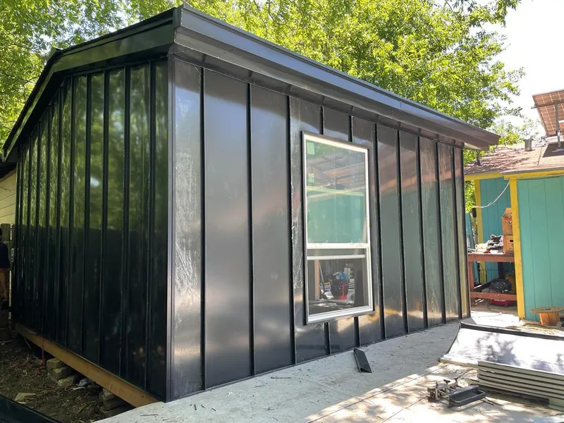 Black standing seam metal wall panels for Metal Roof Installation in Chelsea